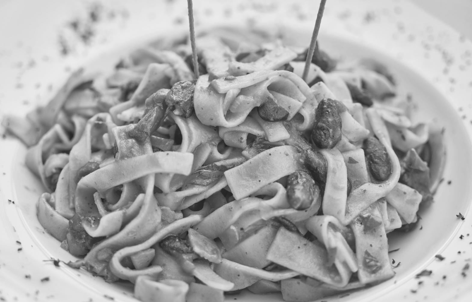 Carefully arranged chocolate pieces demonstrating professional plating techniques with attention to colour balance and spatial composition